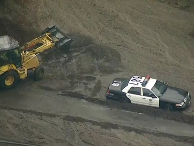 Coast Guard rescues family from roof in mud-drenched California