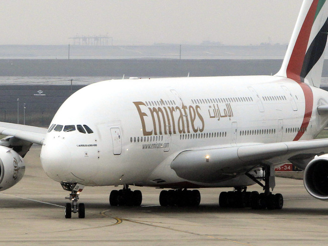 Emirates airline officials say 10 passengers fell ill on flight that landed at JFK